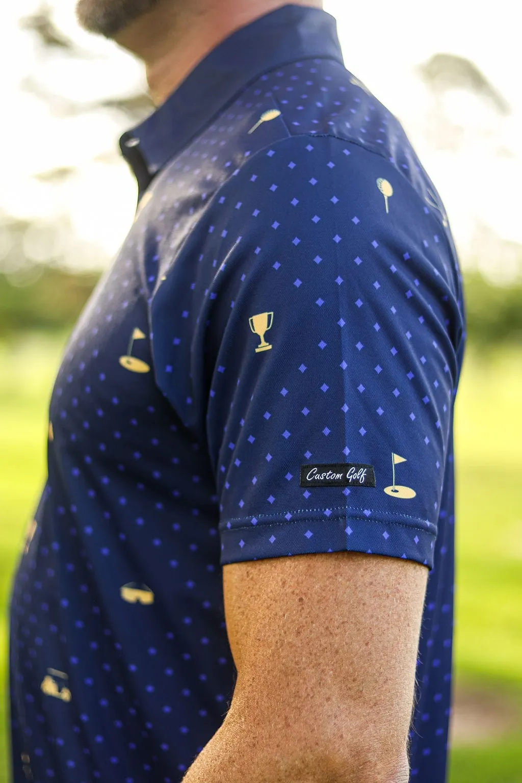 CA Statement Golf Shirt | Navy & Gold