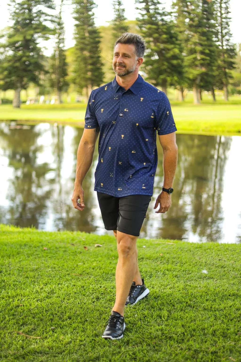 CA Statement Golf Shirt | Navy & Gold
