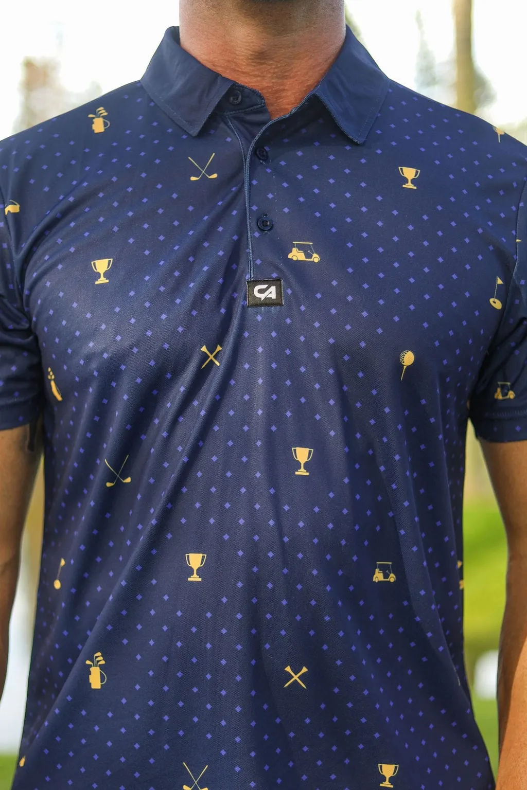 CA Statement Golf Shirt | Navy & Gold