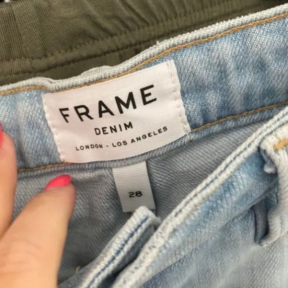 FRAME Denim light wash distressed shorts (NWT)