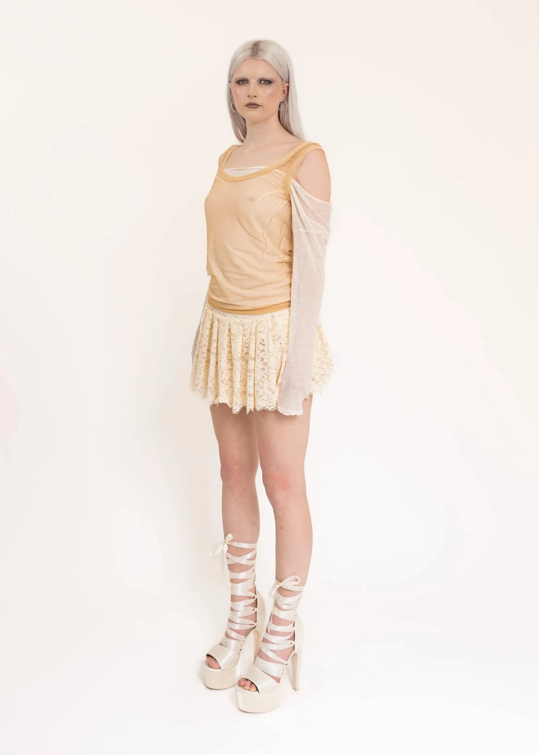 Pleated lace mini skirt