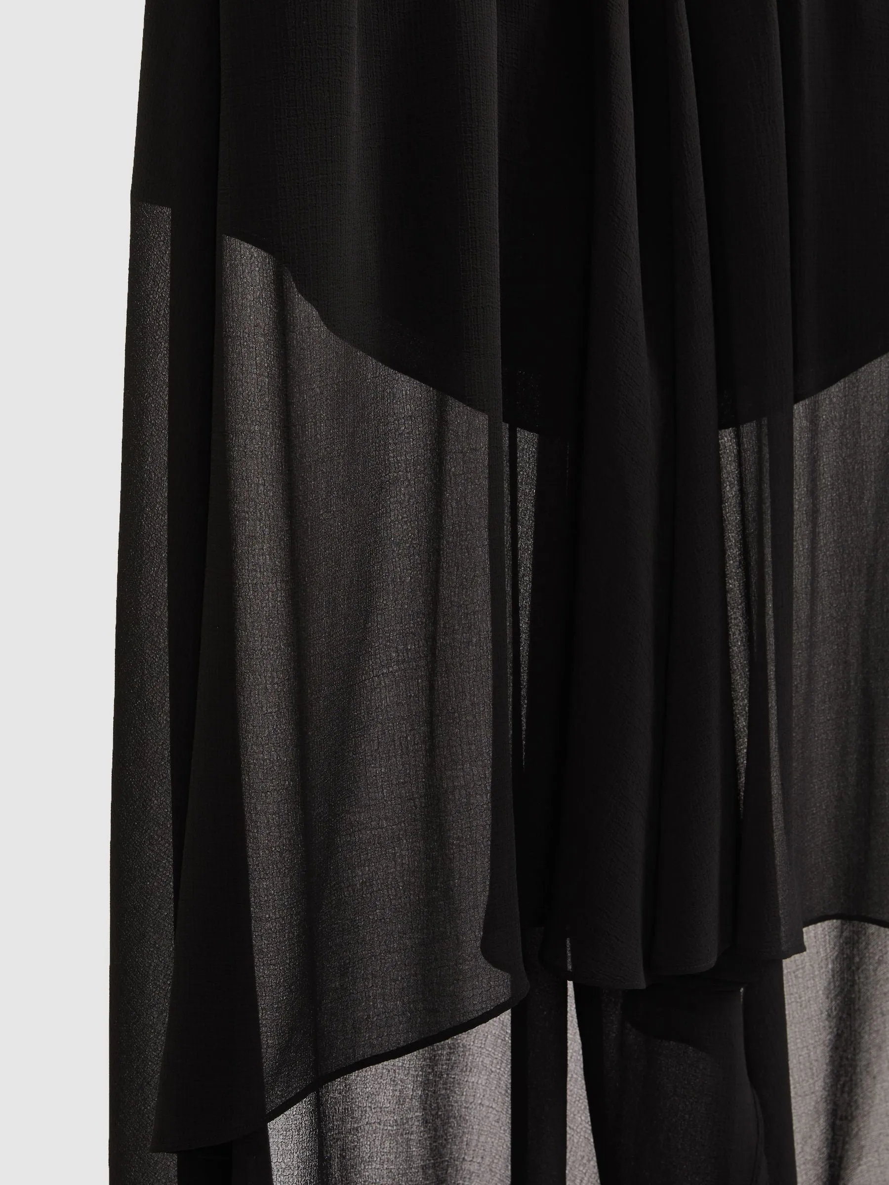 Sheer-Overlay High-Low Shorts in Black