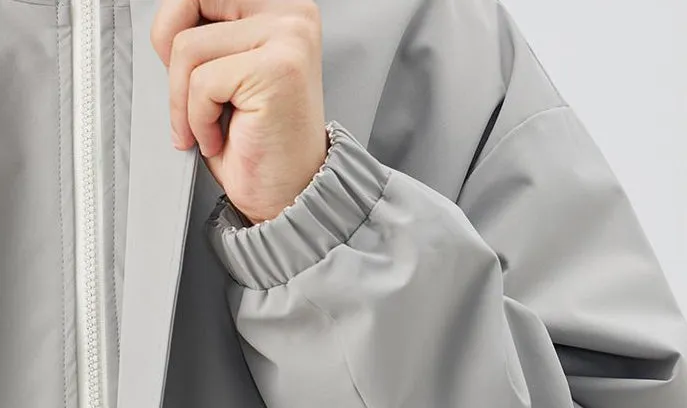Solid Relaxed-Fit Raincoat with Elastic Band Cuffs for Easy Cleaning